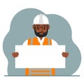 Engineer man holding a blank sheet of paper. The concept of a builder, engineer, planner or designer.