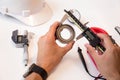 Engineer man using vernier caliper measuring the bearing Royalty Free Stock Photo