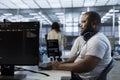 Engineer managing and optimizing data center infrastructure Royalty Free Stock Photo