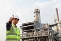 Engineer oil refinery with thumbs up gesture Royalty Free Stock Photo