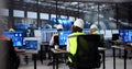 Engineer Operates Scada Software on Modern Desktop