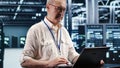 IT engineer optimizing data center Royalty Free Stock Photo
