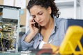 engineer on phone working with circuits Royalty Free Stock Photo