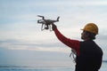 Engineer pilot man holding drone before flight - Focus on right hand Royalty Free Stock Photo