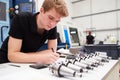 Engineer Planning Project With CNC Machinery In Background Royalty Free Stock Photo