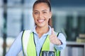 Engineer, portrait and woman with thumbs up in office for project management and success. Architect, construction or Royalty Free Stock Photo