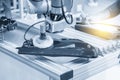The engineer program robotic arm for polishing automotive parts.