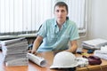 Engineer with project drawings in office Royalty Free Stock Photo