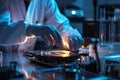 Engineer in protective gloves repairs hard disk