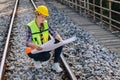 Engineer railway tracks construction service team working on site survey checking and maintenance inspection train track for Royalty Free Stock Photo