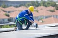 Engineer repair solar panel on the factory rooftop