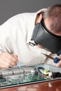 Engineer repairing circuit board