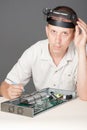 Engineer repairing circuit board