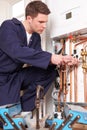 Engineer Servicing Central Heating Boiler Royalty Free Stock Photo