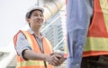 Engineer shaking hand to make business deal Royalty Free Stock Photo