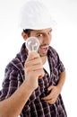 Engineer showing electric bulb Royalty Free Stock Photo