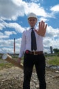 Engineer on site stop sign Royalty Free Stock Photo