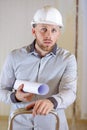 engineer standing backwards to wall with clipboard Royalty Free Stock Photo