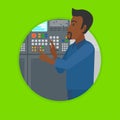 Engineer standing near control panel. Royalty Free Stock Photo