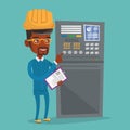 Engineer standing near control panel. Royalty Free Stock Photo