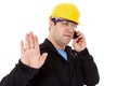 engineer talking on the phone and make the stop sign Royalty Free Stock Photo