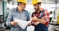 Engineer Teaching Apprentices To Use Computerized cnc metal processing machines Royalty Free Stock Photo