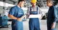 Engineer Teaching Apprentices To Use Computerized cnc metal processing machines Royalty Free Stock Photo