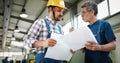 Engineer Teaching Apprentices To Use Computerized cnc metal processing machines Royalty Free Stock Photo