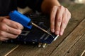 Engineer or technician repair electronic circuit board with soldering iron. Royalty Free Stock Photo