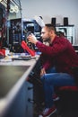 IT engineer technician repairing computer in electronics service shop