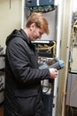 Engineer with telecom analyzer Royalty Free Stock Photo