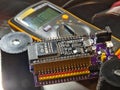 Engineer testing microcontroller board. Close-up of an engineer testing voltage on a modern microc Royalty Free Stock Photo
