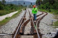 Engineer use theodolite equipment surveying construction worker on Railway site