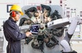 Engineer using laptop computer for maintenance robotic industry Royalty Free Stock Photo