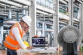 Engineer using laptop computer in thermal power plant factory Royalty Free Stock Photo