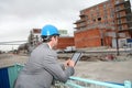 Engineer using tablet on building site Royalty Free Stock Photo
