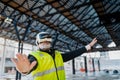 Engineer using virtual reality to inspect building progress. Royalty Free Stock Photo