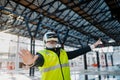 Engineer using virtual reality to inspect building progress. Royalty Free Stock Photo