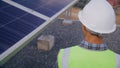 Engineer walk around solar cells station for checking system and maintenance solar panel Royalty Free Stock Photo