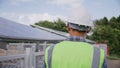 Engineer walk around solar cells station for checking system and maintenance solar panel Royalty Free Stock Photo