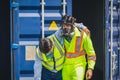 Engineer wear PPE urgently assisted the male technique inside container as Chemical spill in the container shipping industry