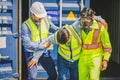 Engineer wear PPE urgently assisted the male technique inside container as Chemical spill in the container shipping industry