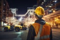 Engineer wearing safety gear observing digital holographic blueprints projections in construction site