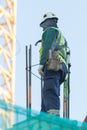 Engineer were walking up the stairs to survey the construction site.