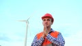 Engineer at wind turbine power plant is hopes for a miracle