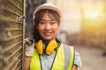 Engineer woman worker, Asian working women happy smiling in hevy industry machinery factory