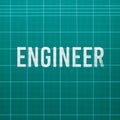 Engineer word on cutting mat Royalty Free Stock Photo