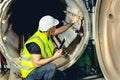 Engineer work service checking and maintenance industry boiler in heavy factory Royalty Free Stock Photo