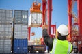 Engineer/worker/freight forwarder working on container terminal port/harbour Royalty Free Stock Photo