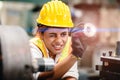 Engineer worker looking at steel gear part, working precise and most accuracy high performance doing best job Royalty Free Stock Photo